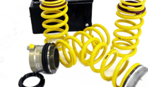 Hydraulic Adjustment in Combination With Suspension Springs